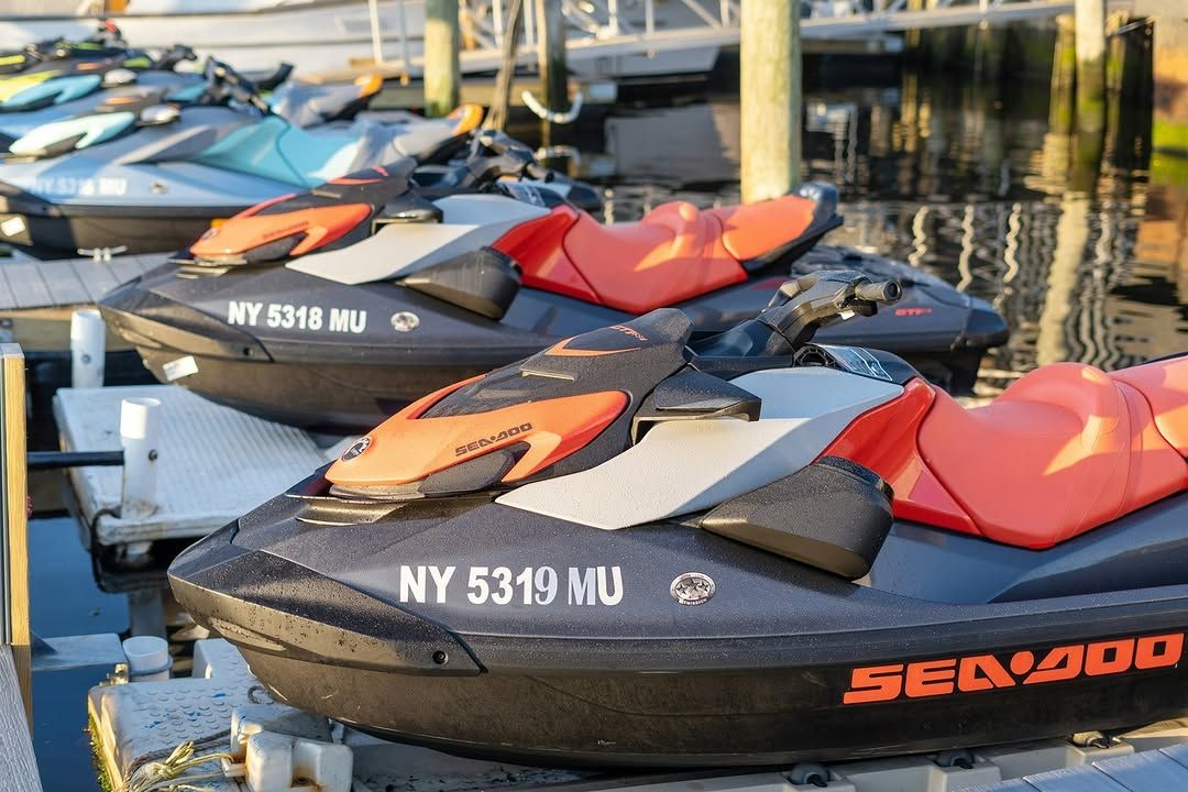 Jet skis lined up on the dock
